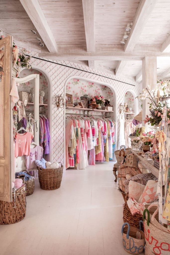 Racks of feminine dresses inside LoveShackFancy's Palm Beach store.  (Photo by WJNPHOTO)