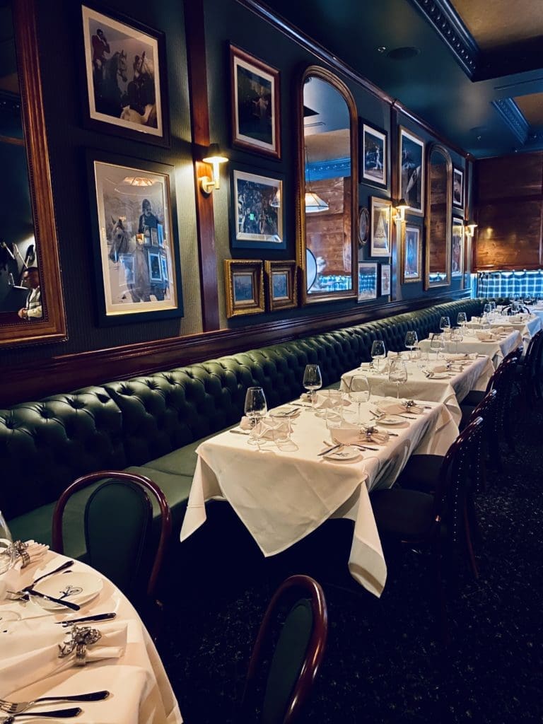 Green leather banquette seating lines the walls of the intimate restaurant that seats only 50.  (Berg Hospitality Group photo)