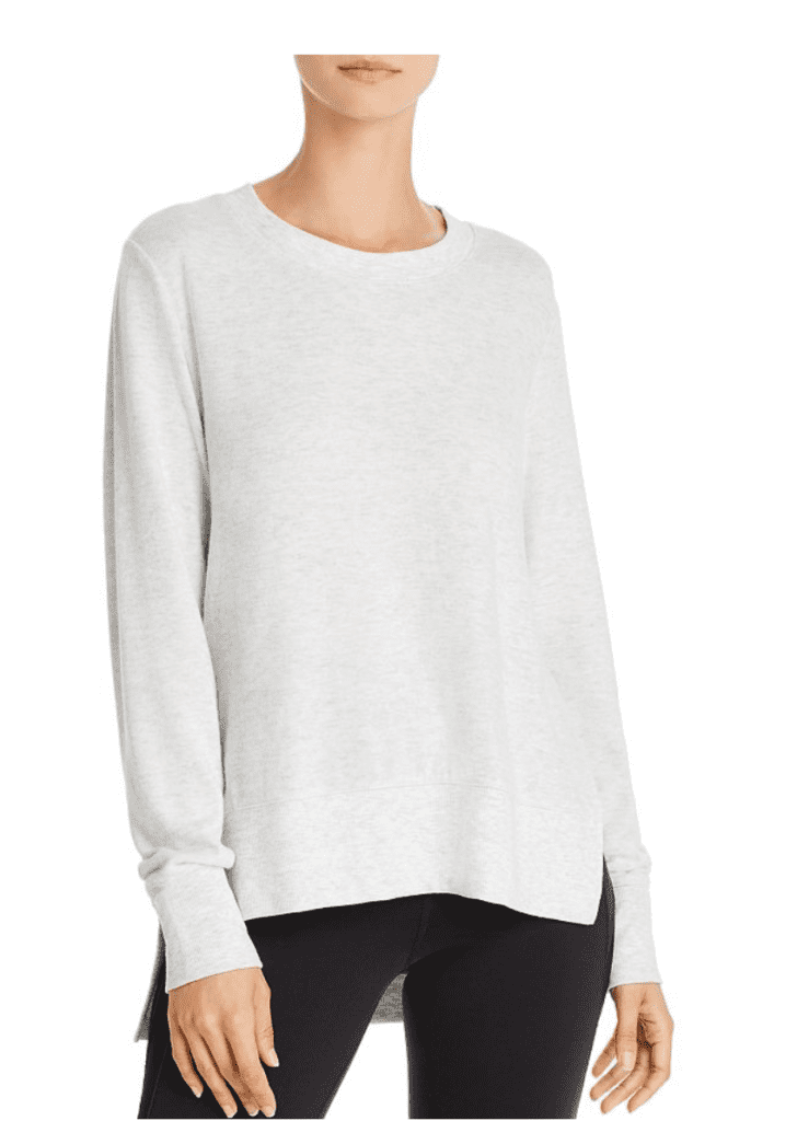 The Al Yoga Glimpse pullover the perfect top for sleeping and working on line ($68 at Bloomingdale's and Neiman Marcus).