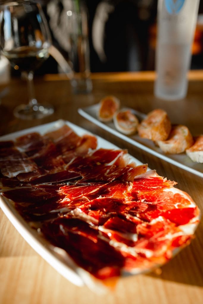 The Jamón Experience at Enrique Tomás is a sampler of all three types of jamón that Enrique Tomás imports, served with tomato-rubbed toasts.