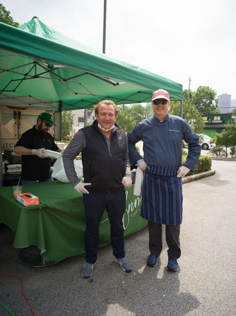 Benjamin Berg and chef Robert Del Grande at B&B Butchers & Restaurant during the barbecue fundraiser for restaurant workers displaced by COVID-19. (Photo by Daniel Ortiz)