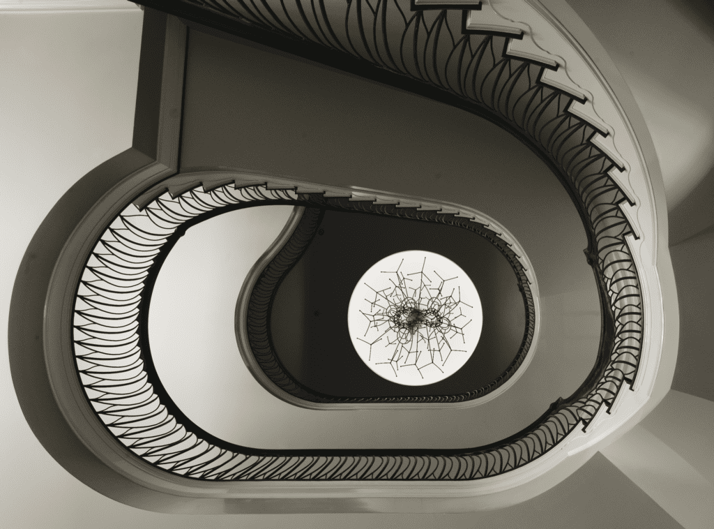 Marilyn Oshman, published November 2013. Interior design Ed Harris/Harris Sanders Interior Design. Photographed by Jack Thompson. In art patroness and founder of The Orange Show Marilyn Oshman’s River Oaks home, soaring stairs by artist Ed Wilson. Dome created by artist James Surls.