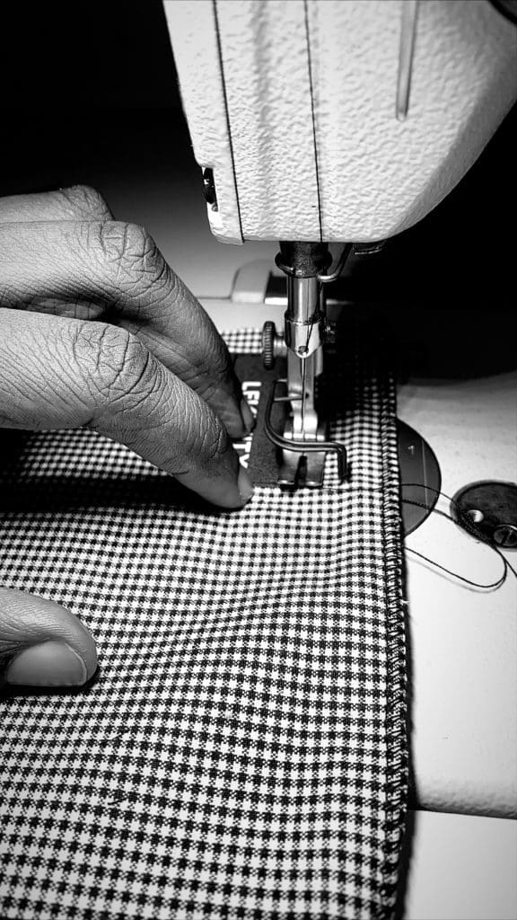 A Levenity mask in progress, made from heavyweight cotton gingham fabric.