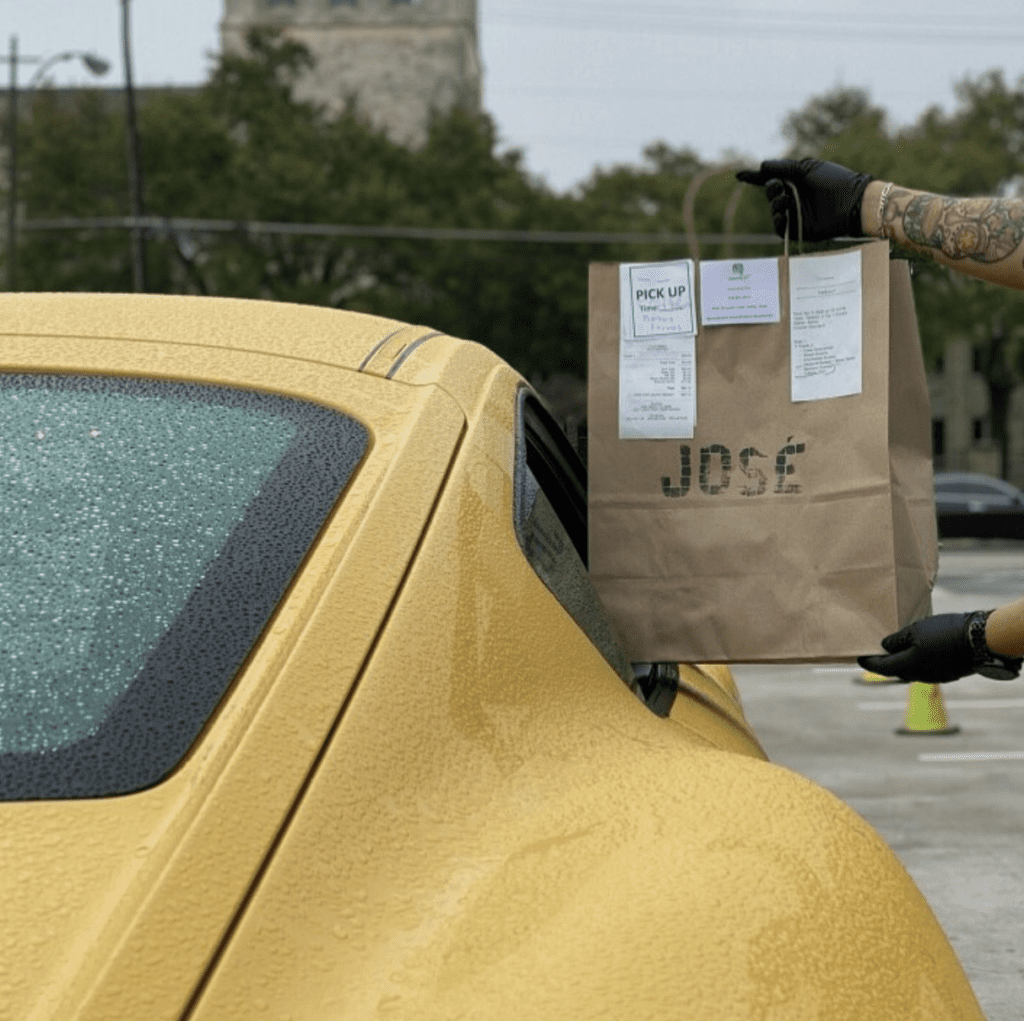 Getting takeout at a distance is part of the new coronavirus normal.