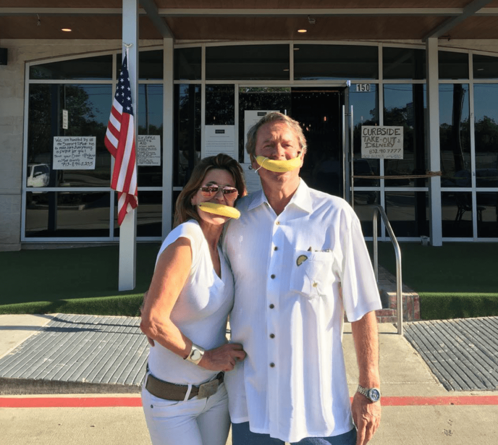 Annie Amante and Bennett Blocker in their 'banana' face masks, a riff on the county typo, at the reopening of the Federal American Grill. (Instagram photo)  
