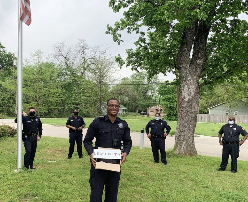 Officers from the Dallas Police Southeast Neighborhood Team wearing Levenity masks.
