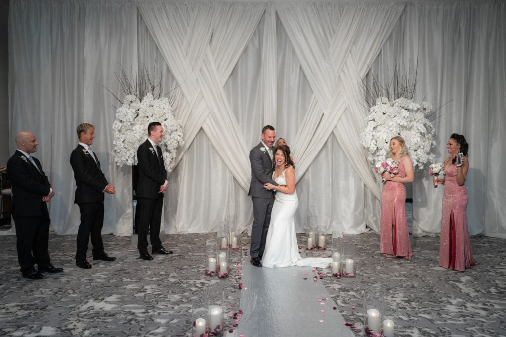 Social distancing sort of worked at the virtual wedding of Tiffiny Scott and Clark Carroll. (Photo by Daniel Pawlowski, (www.theweddingshow.biz))