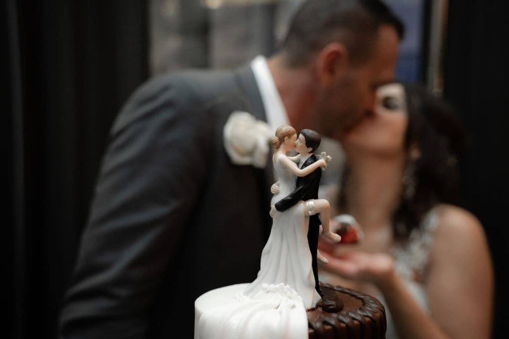 Mr. and Mrs. Clark Carroll share a loving moment on their wedding day at The Post Oak Hotel.   (Photo by Daniel Pawlowski, (www.theweddingshow.biz))