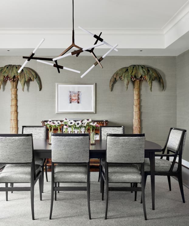 Vintage palm-tree floor lamps by Maison Jansen adorn the dining room of a swanky Houston high-rise. (photo by Casey Dunn) 
