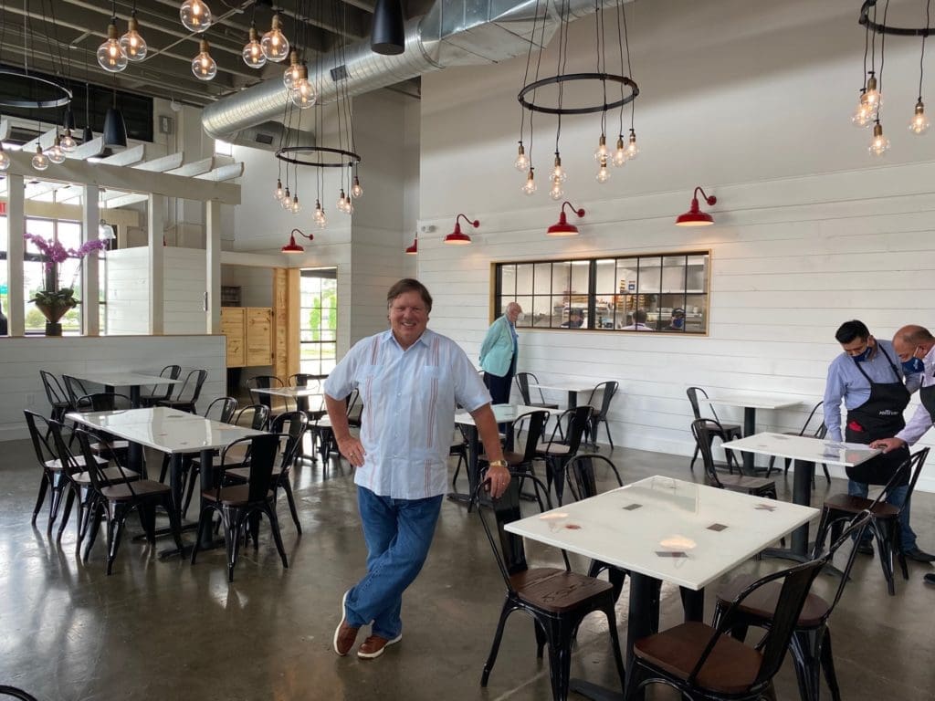 Restaurateur Bill Floyd is all smiles as his Porta'Vino reopens after being shuttered by the coronavirus mandate. (Photo by Shelby Hodge)