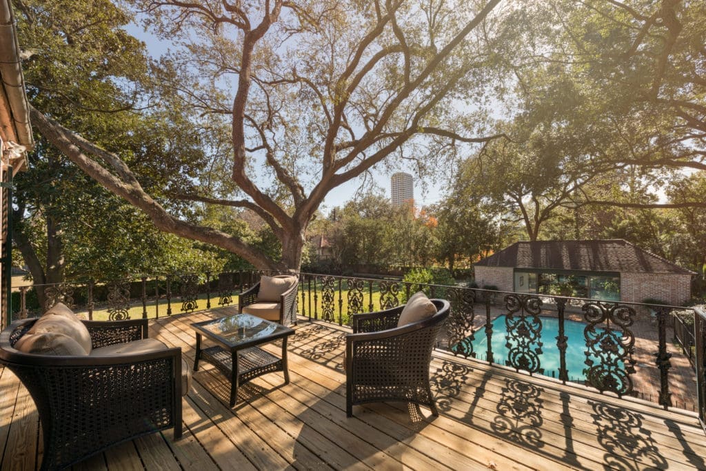 The second-floor terrace overlooks the verdant garden. (Photo by Vlady Ambia)
