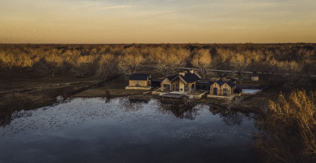 The first home to be built in the Orchards at Pecan Acres overlooks Lucille Lake.  (Photo by Kristian Alveo for Kebony)