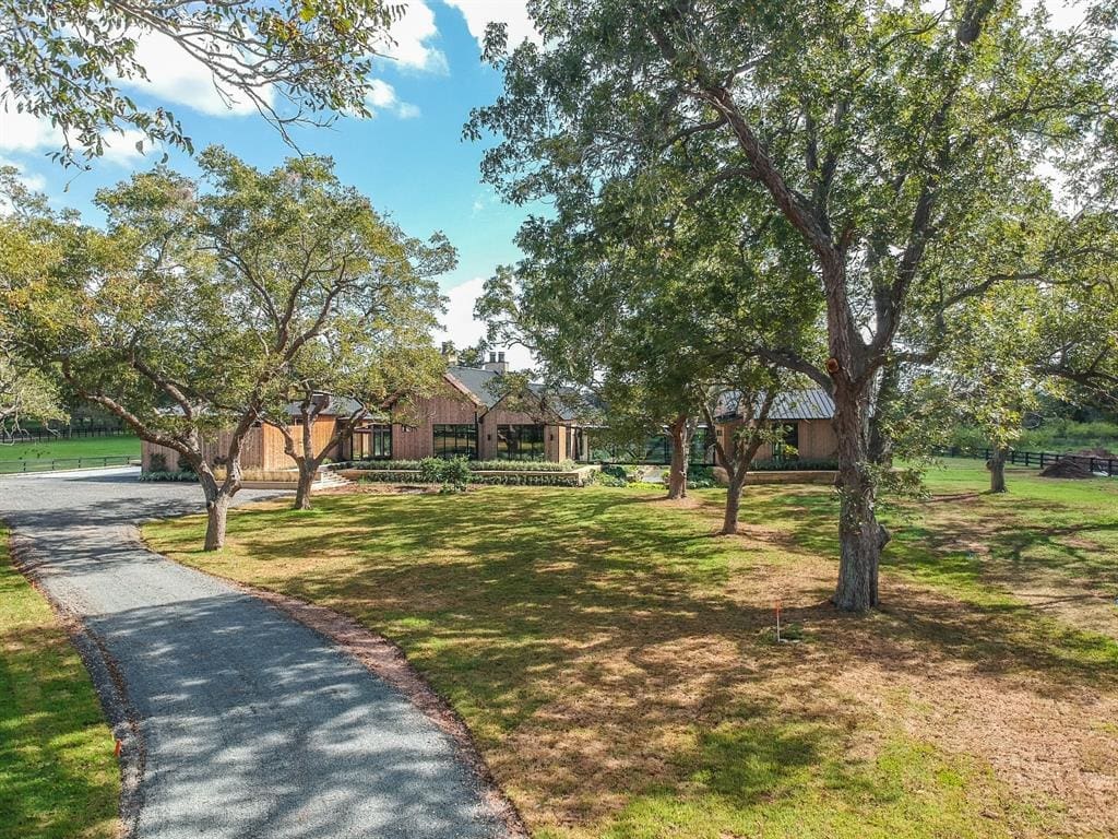 Homes to be built in the Orchards at Pecan Acres are surrounded by grand, aged pecan trees. (Photo by ProHouston)