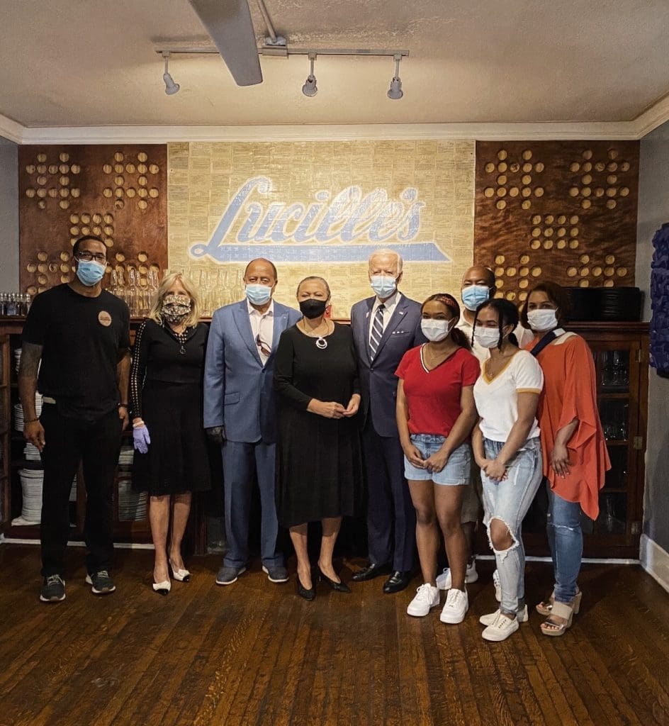 Former Vice President Joe Biden and wife Jill share a photo op with Lucille's owner/executive chef Chris Williams and his family.