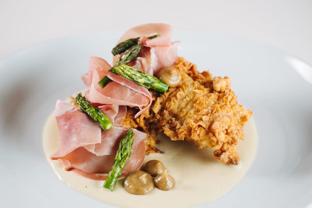 Entrees like chicken, lamb, and filet mignon are on the XOXO Dining menu.