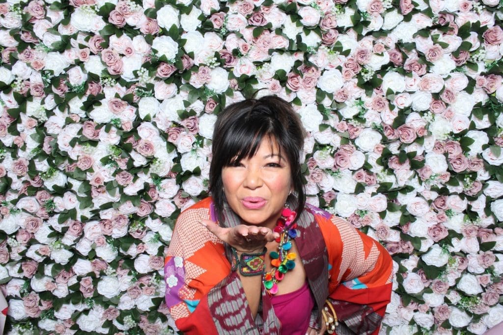 Tina Zulu of Kimono Zulu styling a colorful long-sleeve kimono