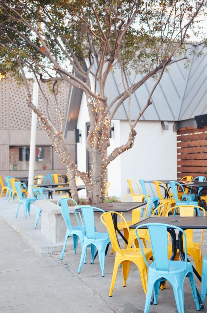 Uno Mas offers outdoor patio seating along Henderson Avenue. 