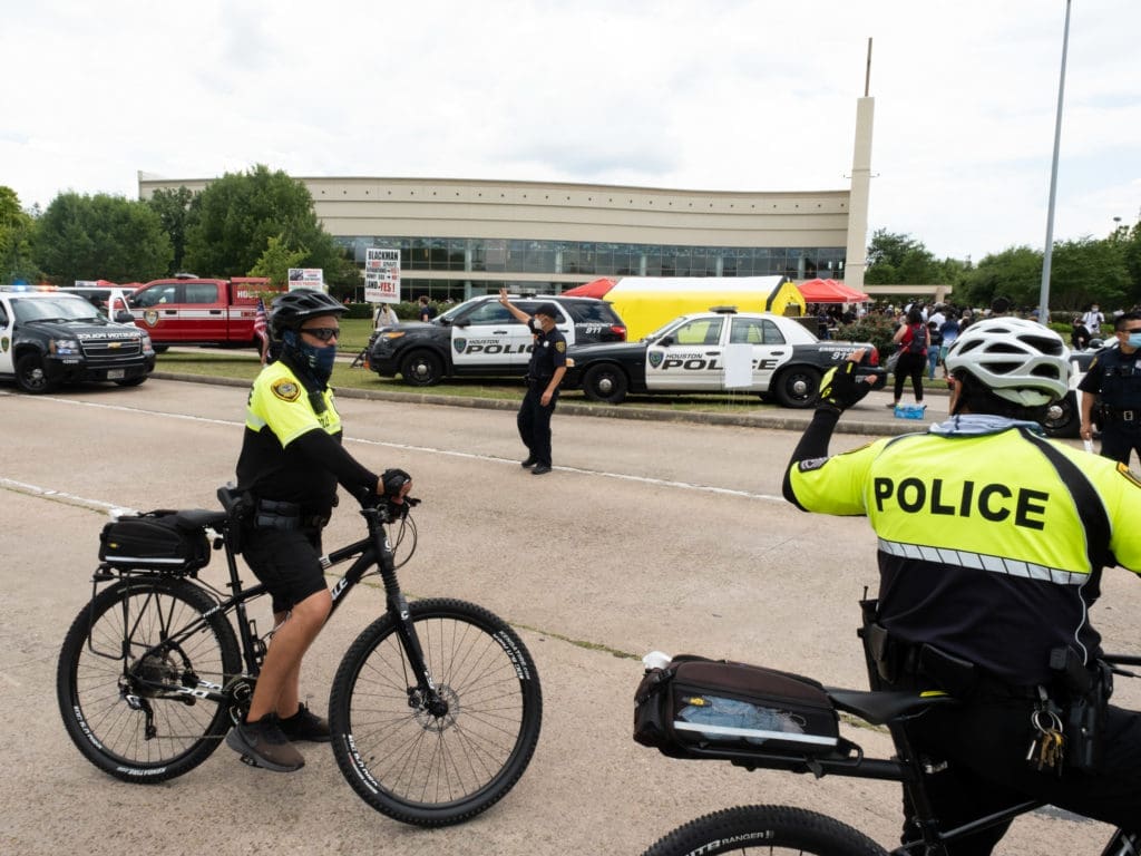 A heavy police presence directed traffic at a very peaceful George Floyd memorial. (Photo by F. Carter Smith)