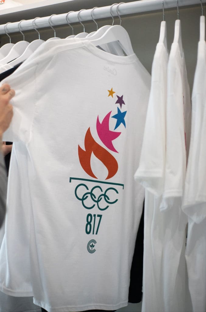 The shop recently launched their a 2020 Summer Games collection — planned pre-pandemic — designed with the two store’s respective zip codes. (Photo by courtesy of Centre)