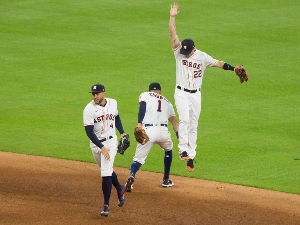 Even" non-contact" celebrations are plenty of fun for a winning baseball team like the Houston Astros. (Photo by F. Carter Smith)
