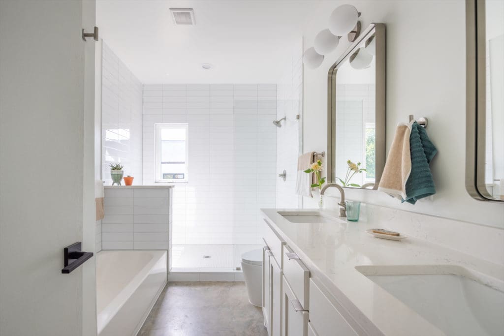 A bright master bathroom. 