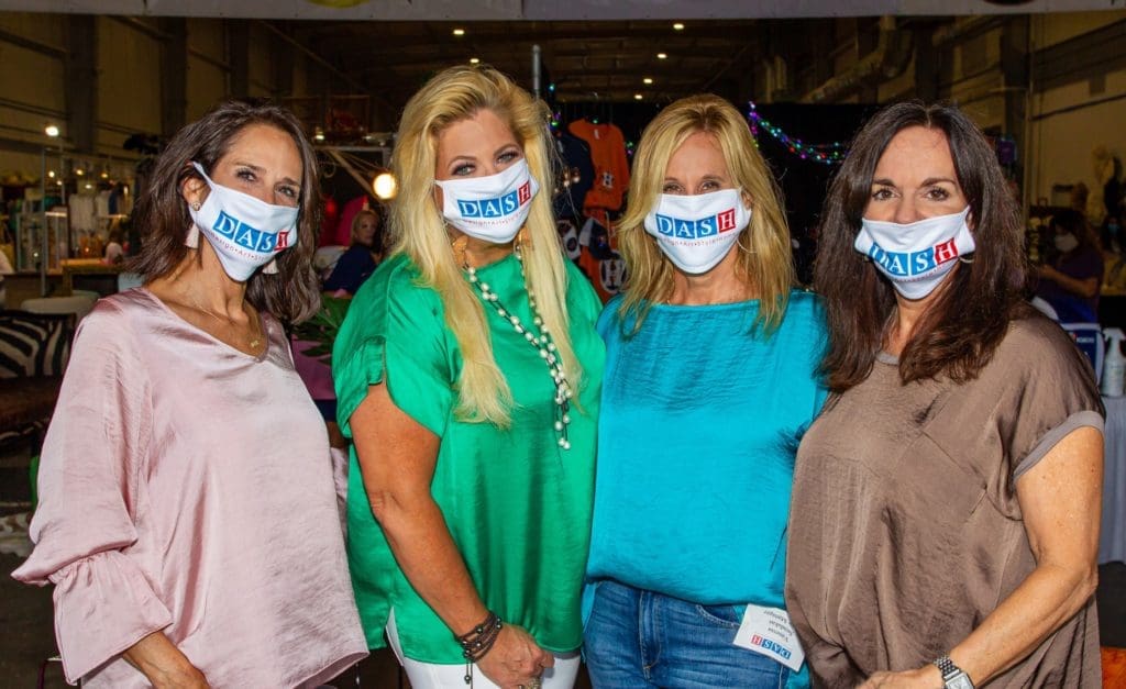 DASH co-founders Lisa Erwin, Michelle Maresh, Vanessa Sendukas, Angela Poujol in July wearing their signature masks necessary in the time of COVID-19. (Photo by Gray Moore Photography)
