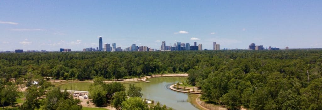 Uptown Houston can be seen in the distance from this perch high above Hines Lake in Memorial Park. (Photo by Memorial Park Conservancy)
