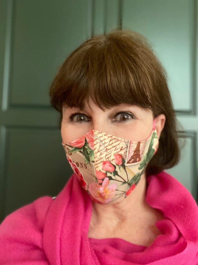 Shelby Hodge in a creative mask by artist Debra Linse, multiple layers, tight fit, fab fabric.