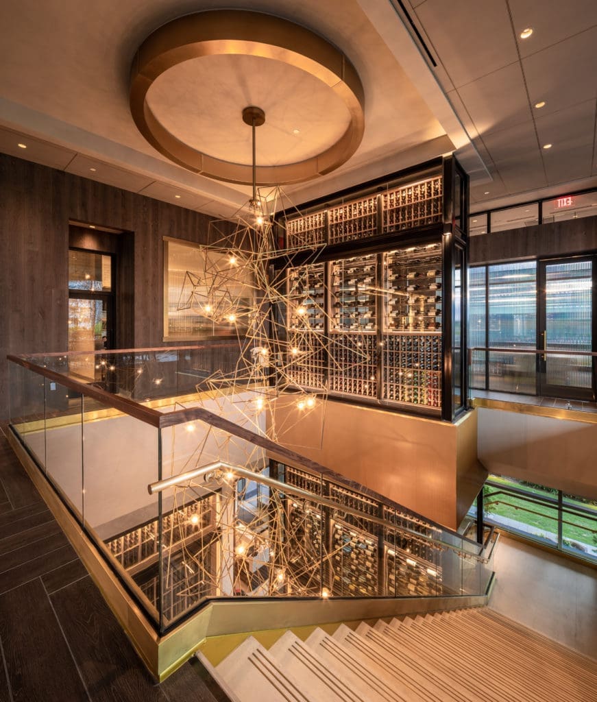Perry's Park District grand staircase from the bar area to the main dining room.