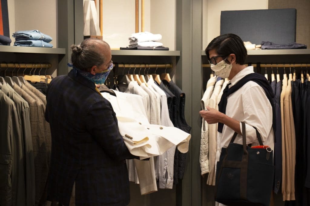 An Eleventy specialist showing current jacket options. (Photo by Zachary Trubenbach)