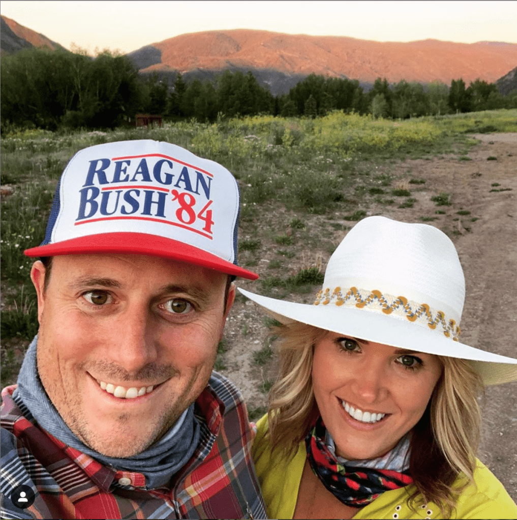 Terry & Amanda Boffone in Aspen in July, he in his retro baseball cap and she in a summer stunner. 
