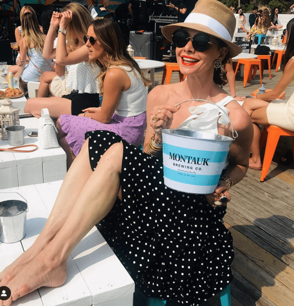 Luxury consignment star Marla Hurley basks in the sun in an updated fedora.
