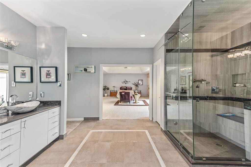The updated master bath leads directly to the master bedroom.