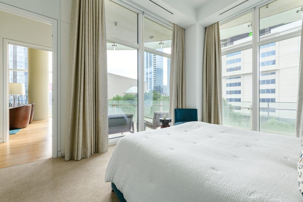 Second bedroom with view to terrace.