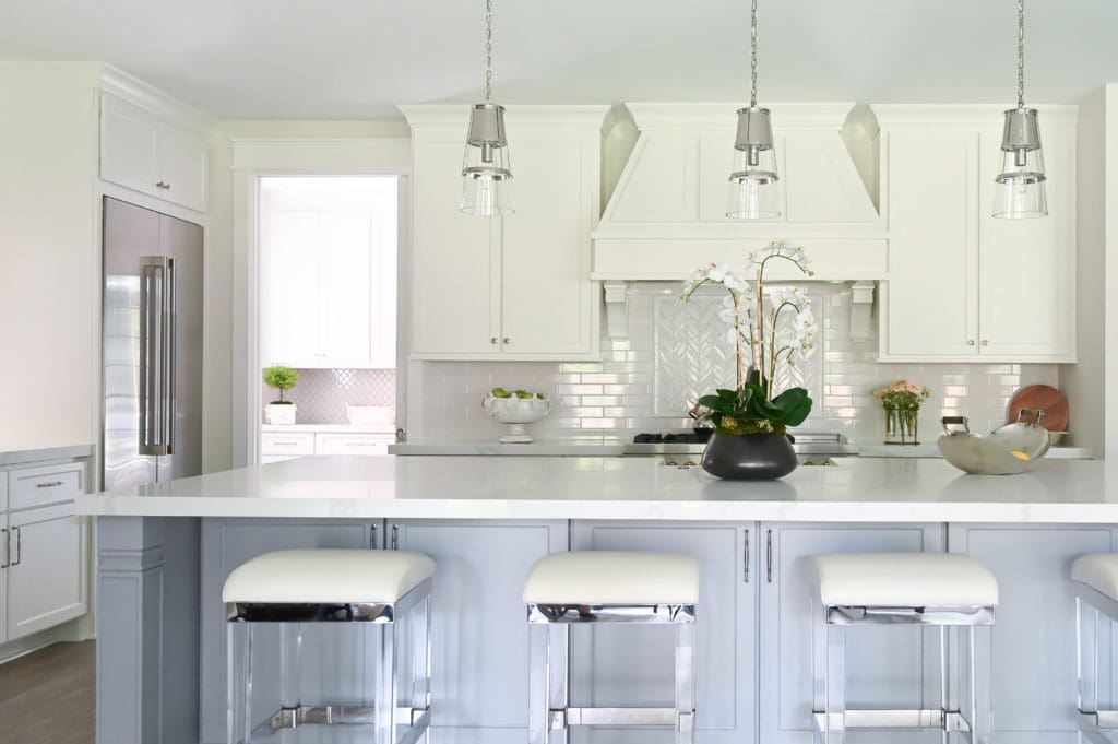 The bar stools in the kitchen come from the Chabonneau Studio Collection.