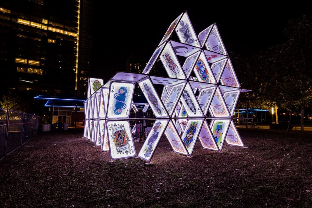 The House of Cards installation will light up Discovery Green nightly through October 11. (Photo by  Trish Badger, Courtesy of Weingarten Art Group)