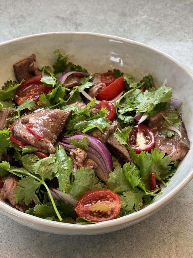 Chrissy Teigen's Thai Beef Salad is one of four recipes that Chef Chris Shepherd will be cooking in his Zoom cooking class. (Instagram photo)
