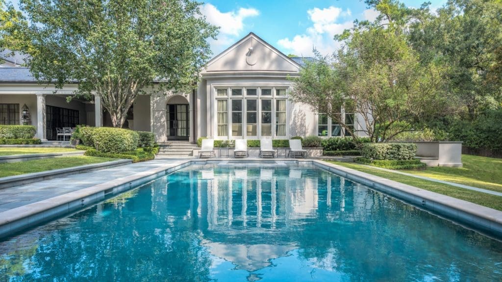 The azure blue pool at 206 Kinkaid School Drive.