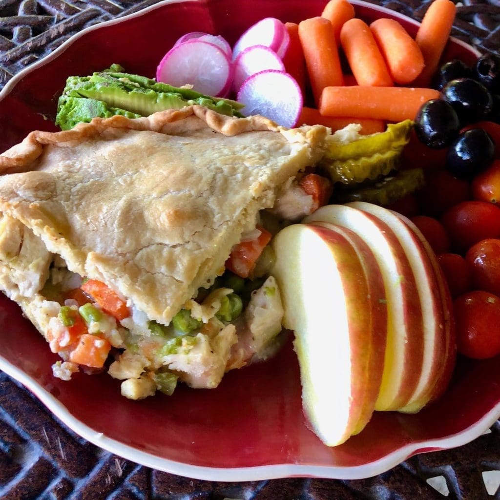 McKinley's lunch plate featuring a slice of chicken pot pie. 