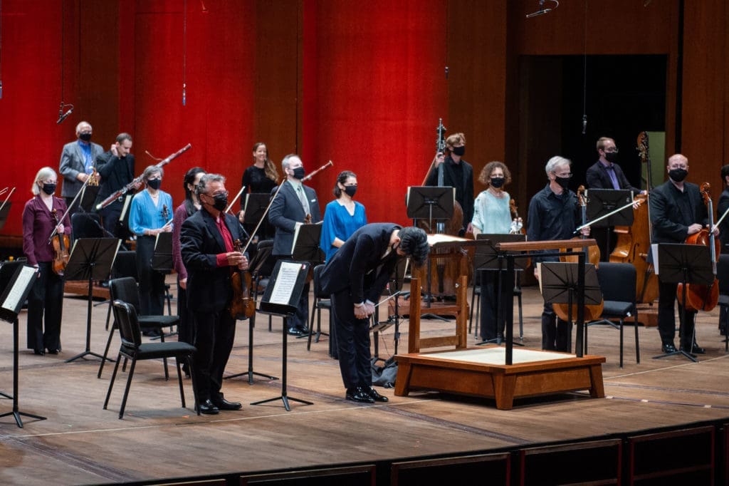 Houston Symphony musicians bow to the standing ovation as they complete their "Live From Jones Hall" concert. (Photo by Wilson Parish)