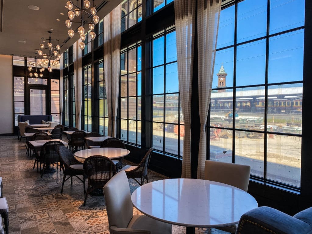 Walls of windows take in the view of the Grapevine's historic railyard. 