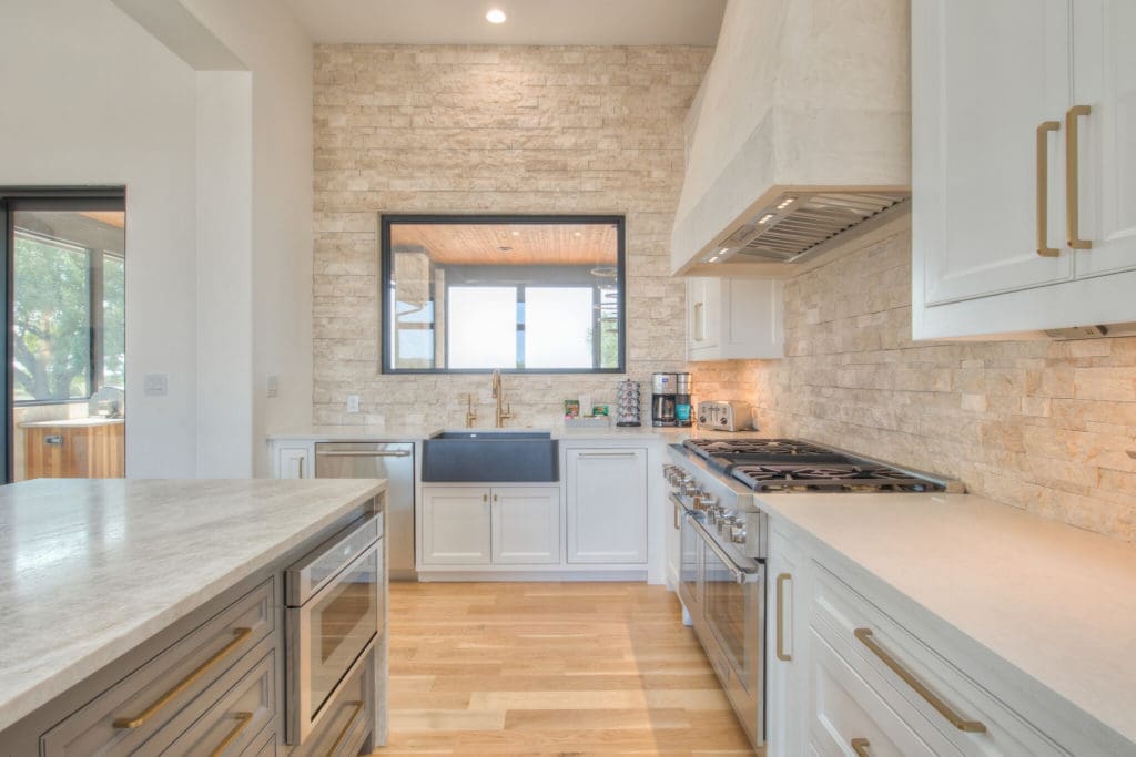 Entertaining is a joy thanks to an airy open floor plan and gourmet kitchen.