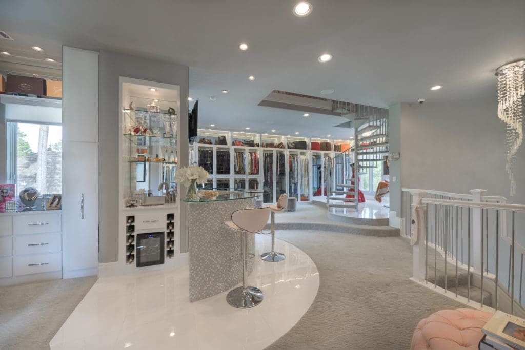 The champagne bar on the second floor of the three-story closet. 