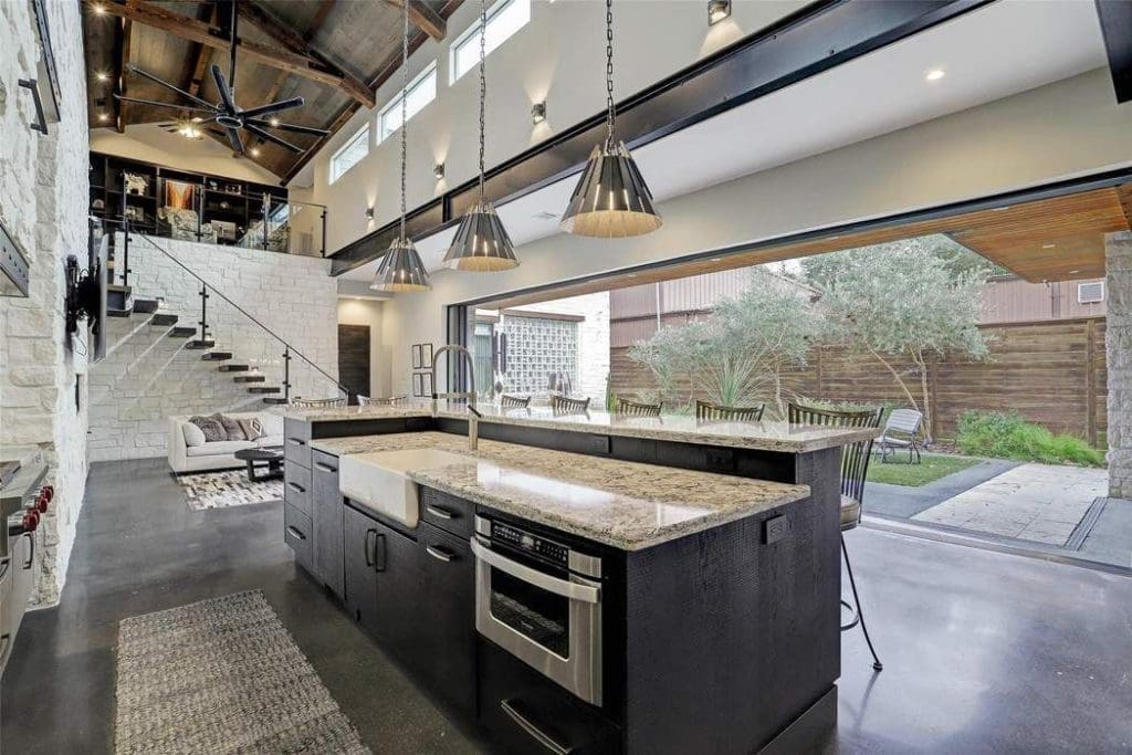 A view to the backyard terrace from the kitchen. 