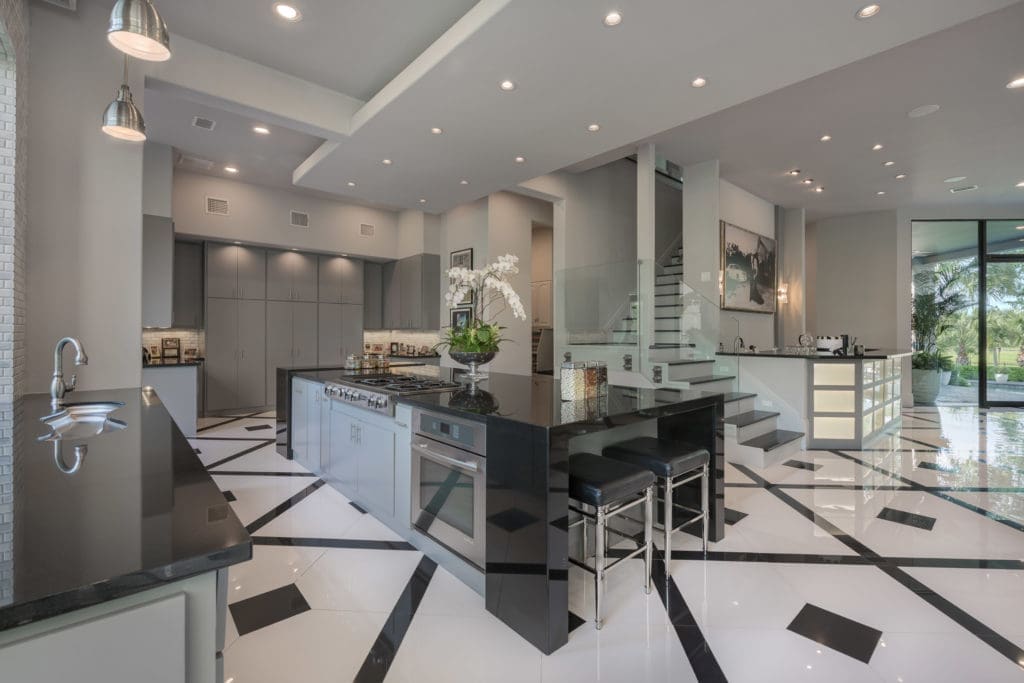 A wide-open kitchen bespeaks of classy cooking and home entertaining.