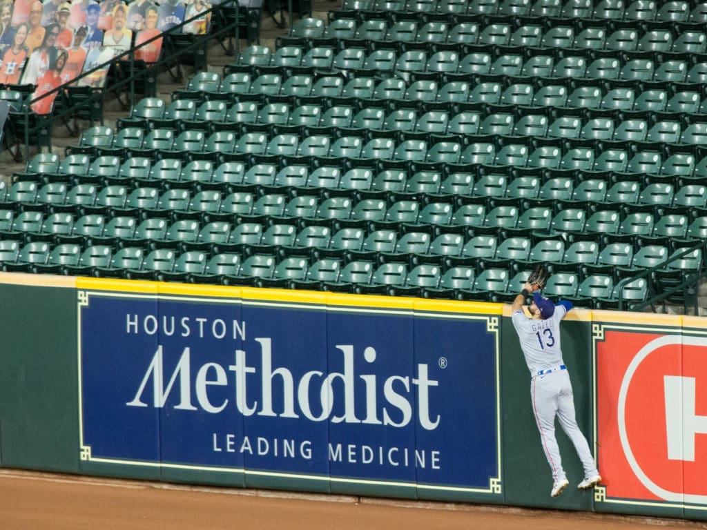 Kyle Tucker's home run just eluded Rangers right fielder Joey Gallo. (Photo by F. Carter Smith)