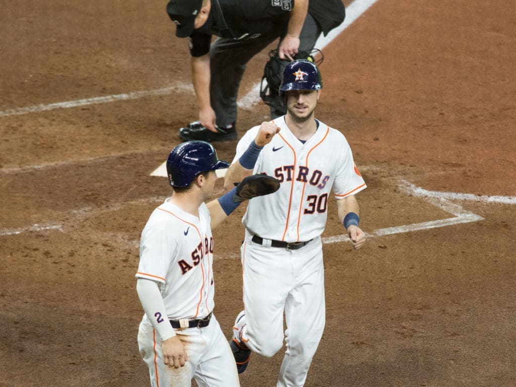 Kyle Tucker gets some love from Alex Bregman. (Photo by F. Carter Smith)