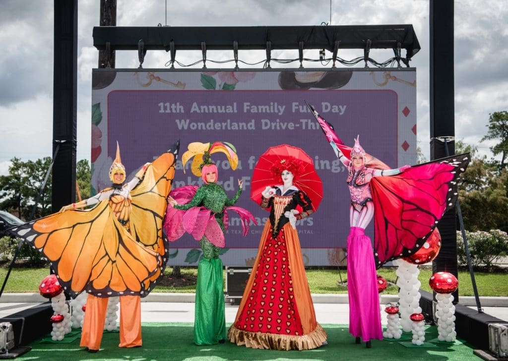 Beautiful whimsical characters add colorful fun to the family day. (Photo by  Brandy Stoesz Photography)