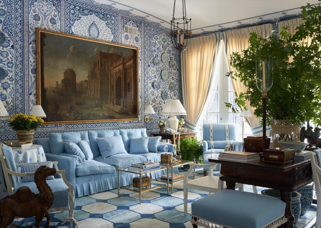 Dallas Kips Bay Decorator House: A large-scale painting from John Nelson Antiques in L.A., is a dramatic foil for the custom Iksel wallpaper. Sofa is Mark Sikes for Chaddock Home, covered in Schumacher fabric. (Photo Stephen Karlisch)