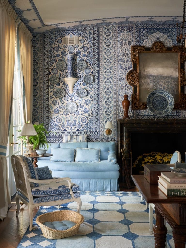 Dallas Kips Bay Decorator House: In Mark Sikes' Kips Bay living room, a custom wallpaper by Iksel Decorative Arts is an airy blue and white Portuguese tile motif. Portuguese and Italian antiques throughout are from Nick Brock, John Nelson Antiques and Parc Monceau Antiques. (Photo Stephen Karlisch)